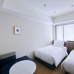 Zimmer mit zwei Einzelbetten