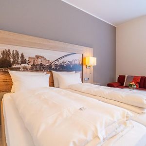 Deluxe Zimmer mit Kingsize-Bett