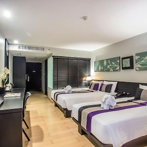 Grand Deluxe Dreibettzimmer