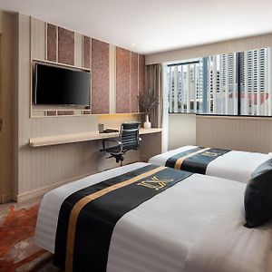 Angrenzendes Zimmer mit zwei Einzelbetten