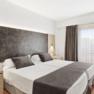 Zimmer mit zwei Einzelbetten