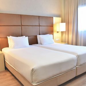 Standard Zimmer mit zwei Einzelbetten für Gäste mit Behinderungen