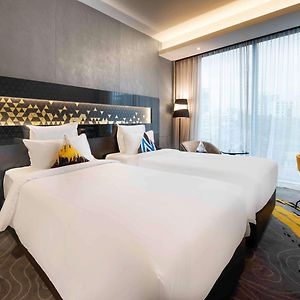 Deluxe Zimmer mit zwei Einzelbetten auf den oberen Etagen