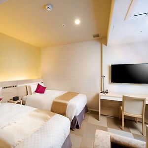 Deluxe Zimmer mit zwei Einzelbetten für Gäste mit Behinderungen
