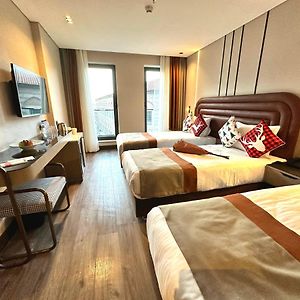 Deluxe Dreibettzimmer
