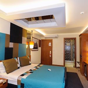 Deluxe Zimmer mit Kingsize-Bett