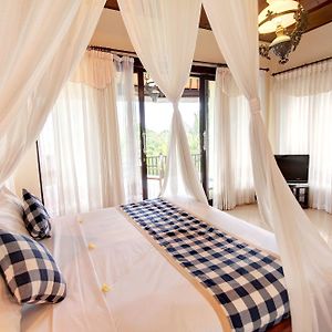 Zimmer mit 1 Schlafzimmer und mit Kingsize-Bett