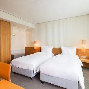 Zimmer mit zwei Einzelbetten auf den oberen Etagen