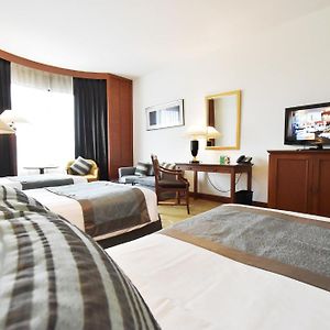 Grand Deluxe Dreibettzimmer