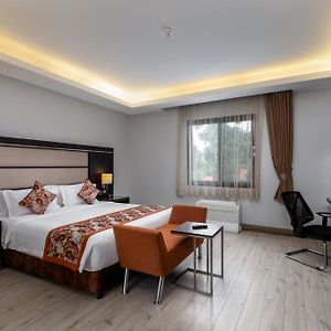 Deluxe Zimmer mit Kingsize-Bett