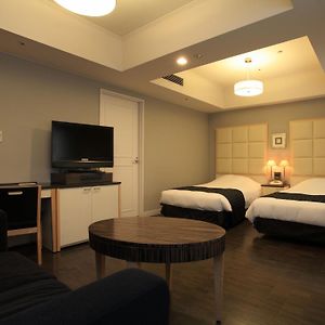 Familien-Zimmer mit zwei Einzelbetten