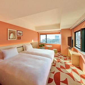 Deluxe Eck-Zimmer mit zwei Einzelbetten