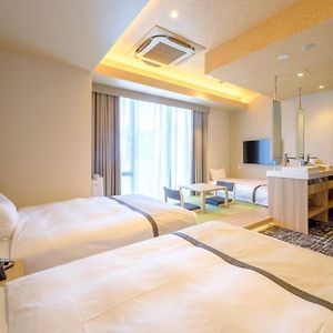 Deluxe Dreibettzimmer