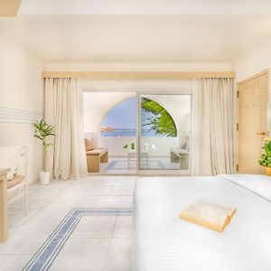 Zimmer mit zwei Einzelbetten und mit Strandblick