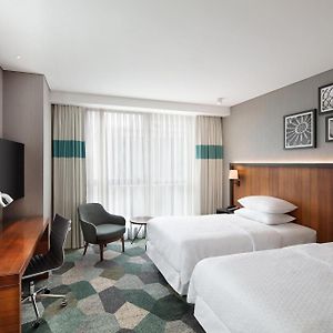 Deluxe Eck-Zimmer mit zwei Einzelbetten