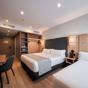Deluxe Dreibettzimmer