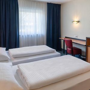 Zimmer mit zwei Einzelbetten
