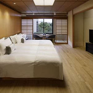 Zimmer im Japanischen Stil mit zwei Einzelbetten
