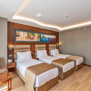 Deluxe Dreibettzimmer