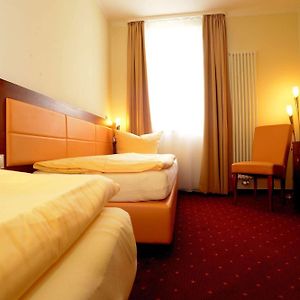 Zimmer mit zwei Einzelbetten