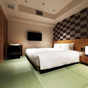 Zimmer im Japanischen Stil mit Kingsize-Bett